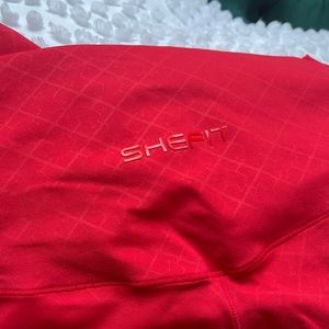 Shefit leggings that are in excellent condition. Color is red. Size luxe.